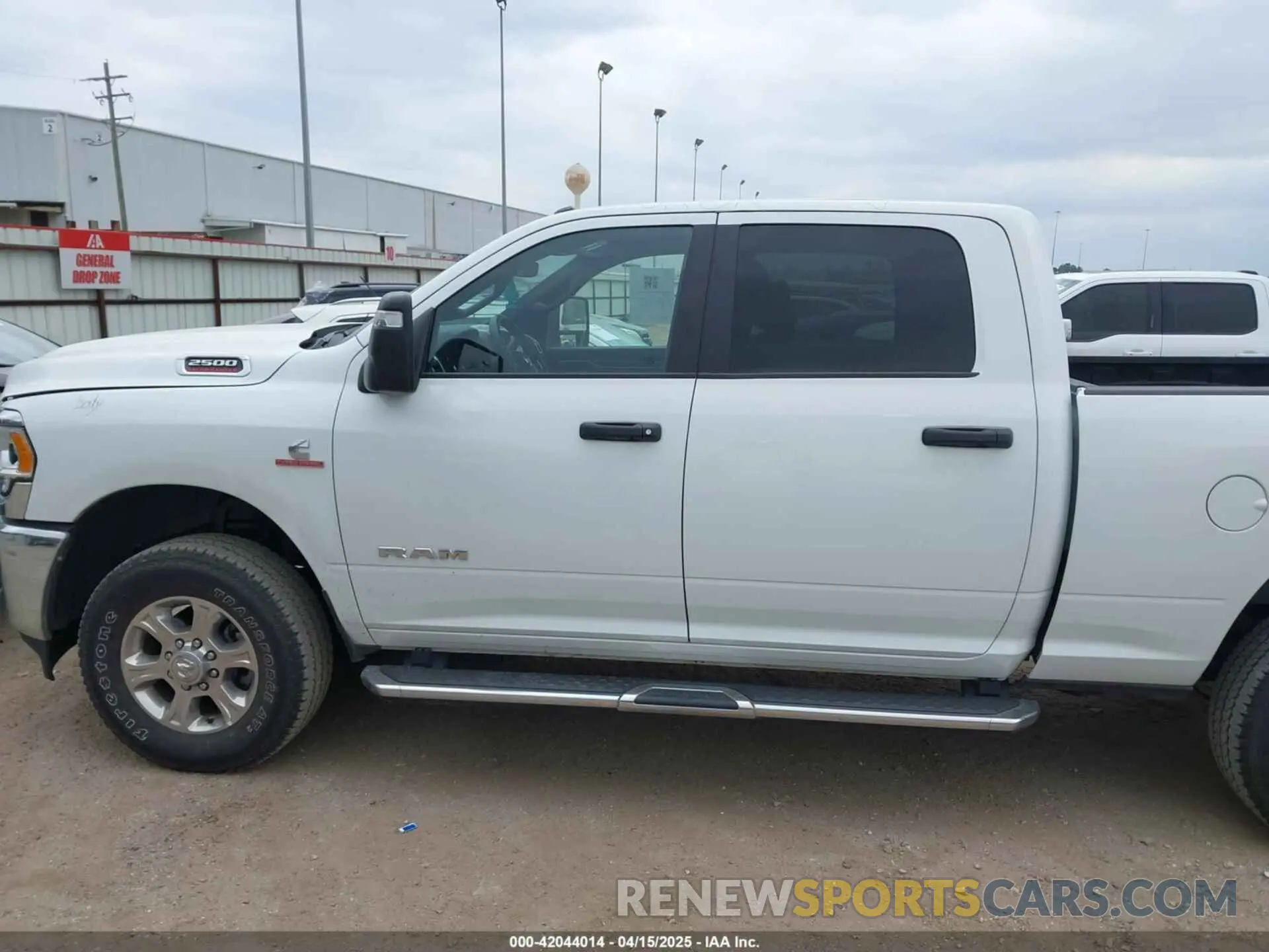 14 Photograph of a damaged car 3C6UR5DL1RG296302 RAM 2500 2024