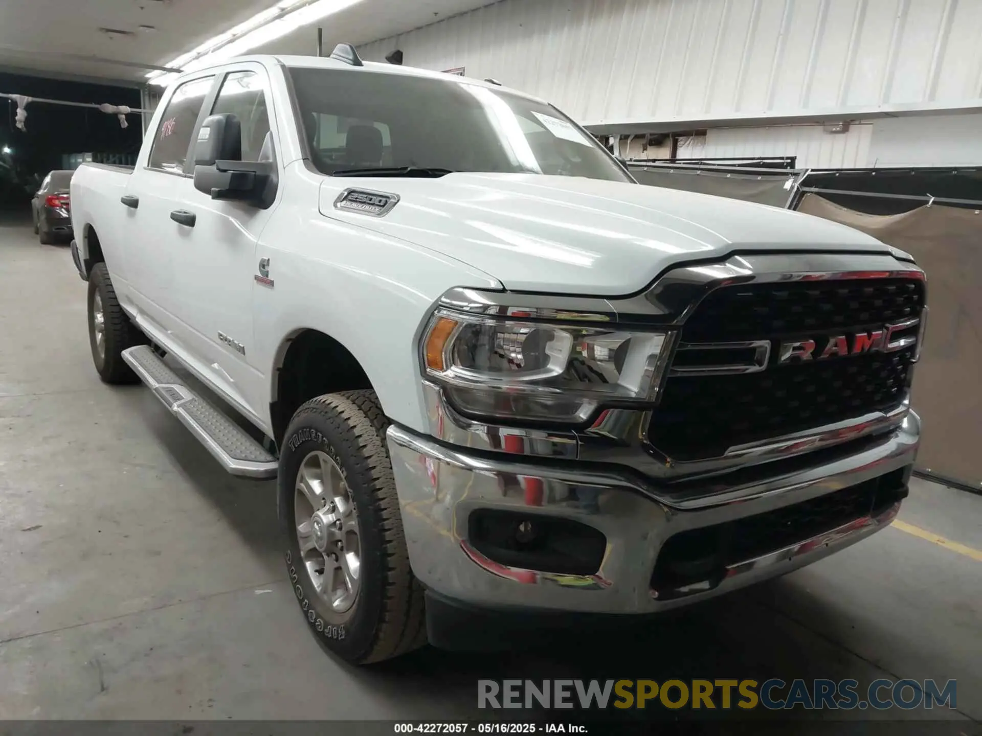1 Photograph of a damaged car 3C6UR5DL1RG338595 RAM 2500 2024
