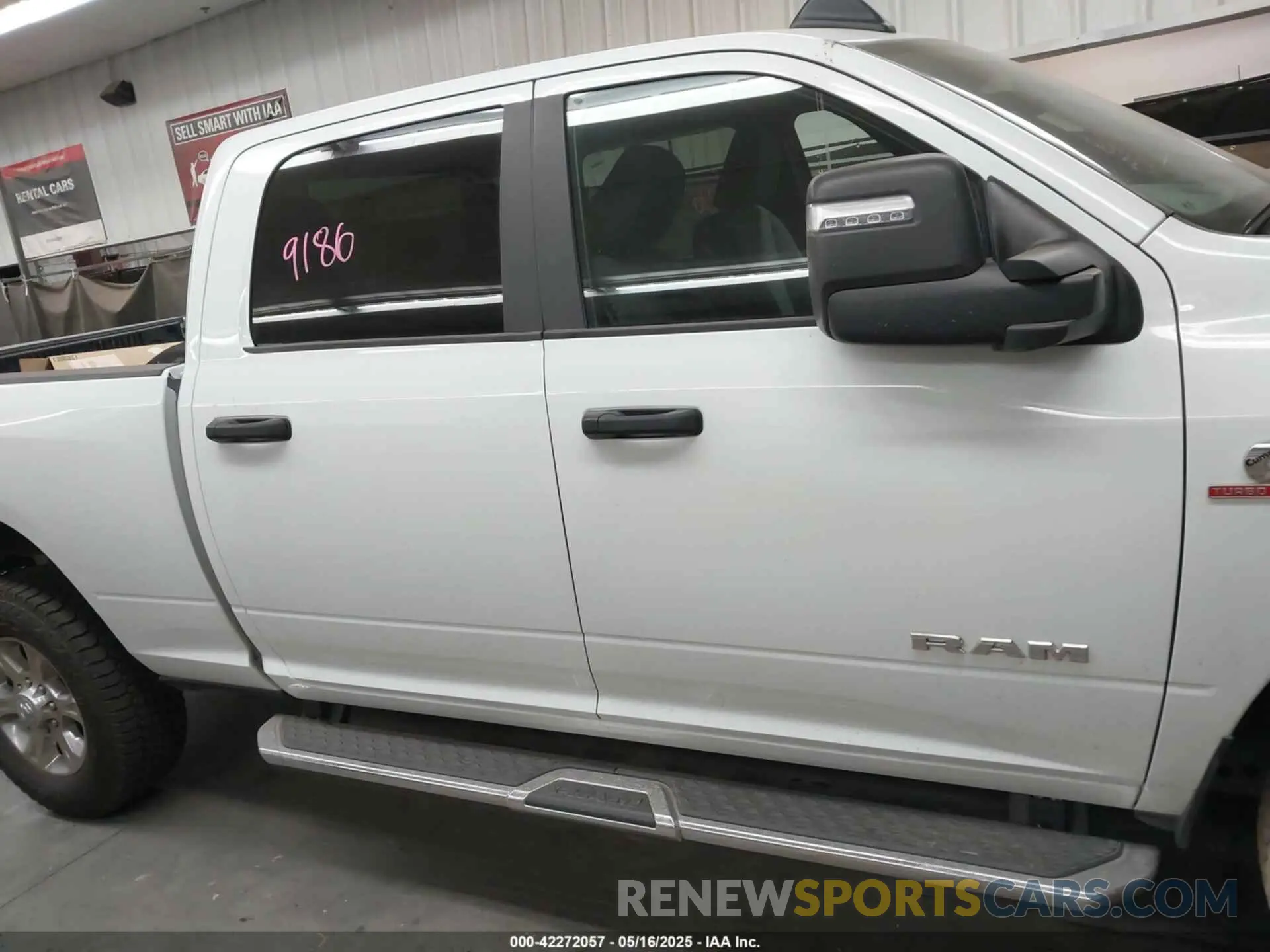 12 Photograph of a damaged car 3C6UR5DL1RG338595 RAM 2500 2024