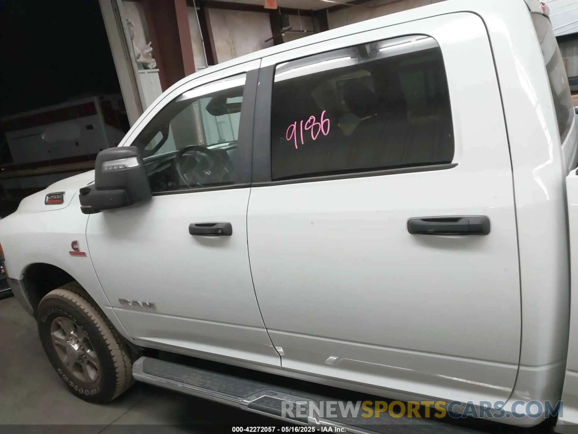 13 Photograph of a damaged car 3C6UR5DL1RG338595 RAM 2500 2024