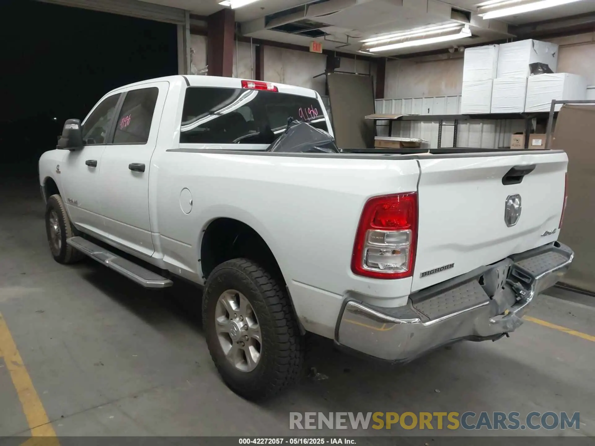 3 Photograph of a damaged car 3C6UR5DL1RG338595 RAM 2500 2024