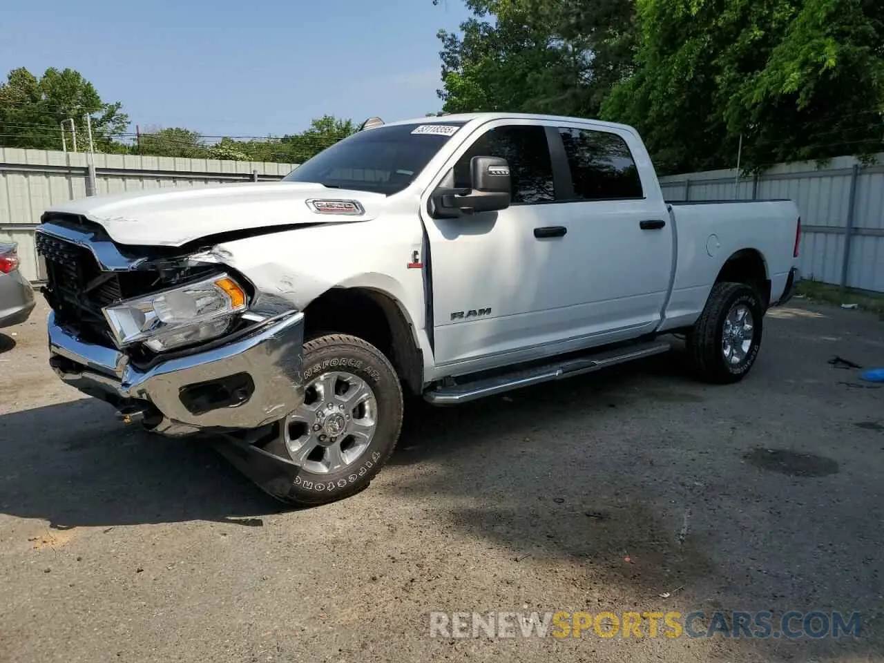 1 Photograph of a damaged car 3C6UR5DL1RG349340 RAM 2500 2024