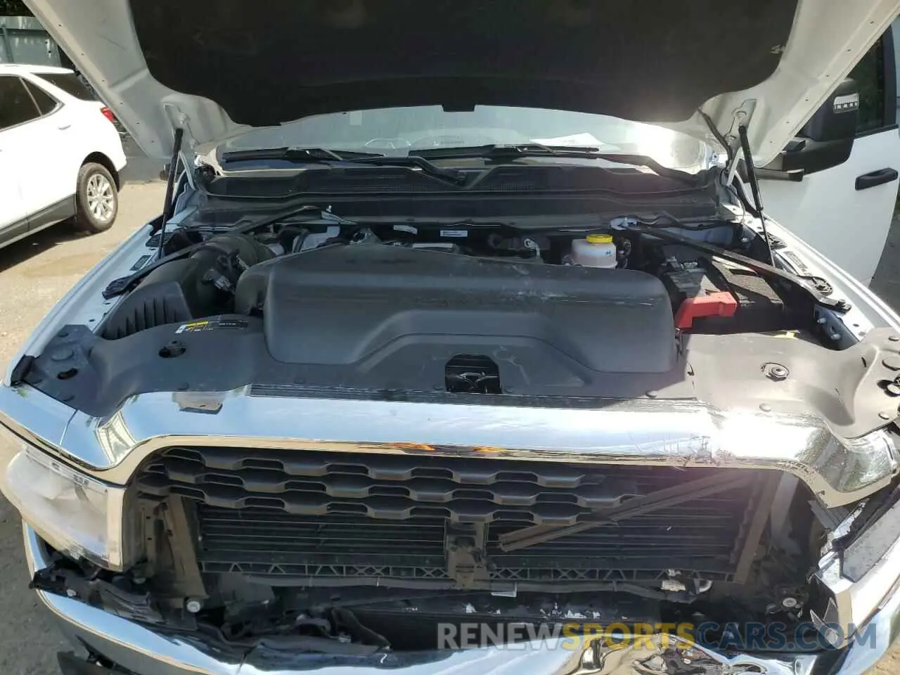 11 Photograph of a damaged car 3C6UR5DL1RG349340 RAM 2500 2024