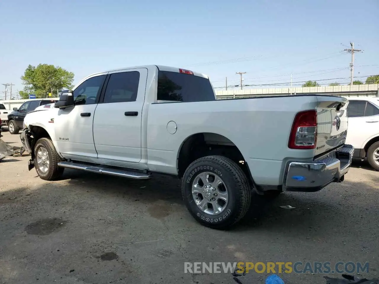 2 Photograph of a damaged car 3C6UR5DL1RG349340 RAM 2500 2024