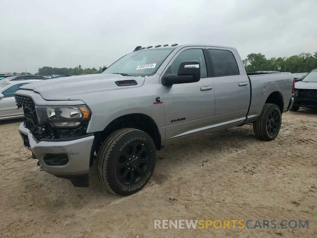 1 Photograph of a damaged car 3C6UR5DL1RG361388 RAM 2500 2024