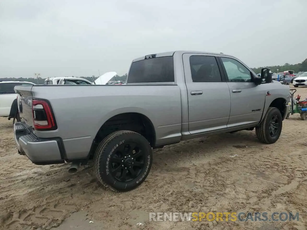 3 Photograph of a damaged car 3C6UR5DL1RG361388 RAM 2500 2024