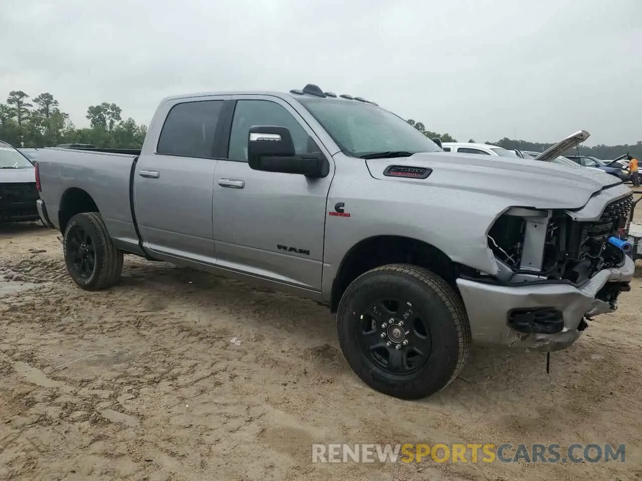 4 Photograph of a damaged car 3C6UR5DL1RG361388 RAM 2500 2024