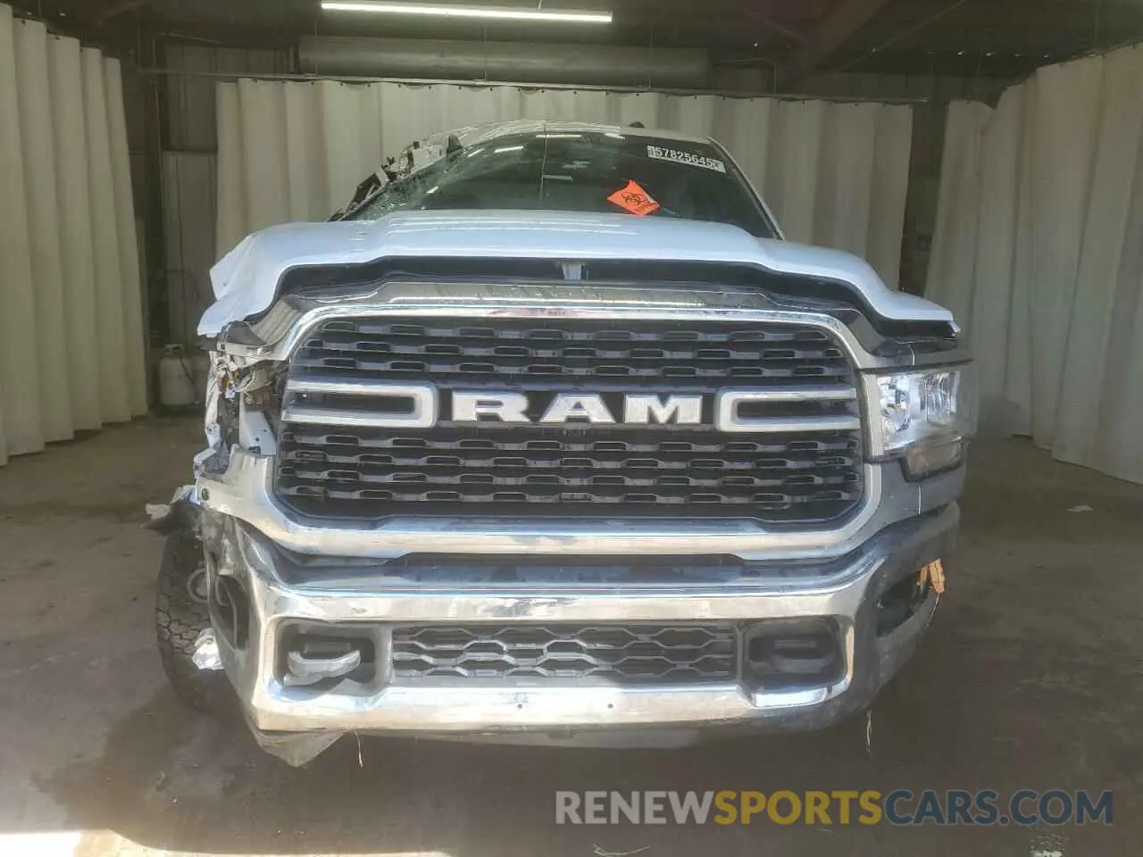 5 Photograph of a damaged car 3C6UR5DL2RG101498 RAM 2500 2024