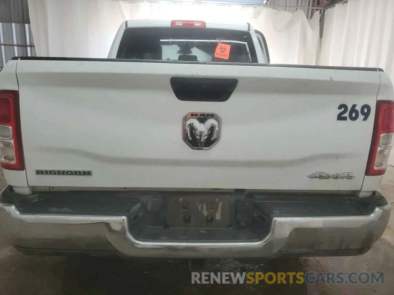 6 Photograph of a damaged car 3C6UR5DL2RG101498 RAM 2500 2024