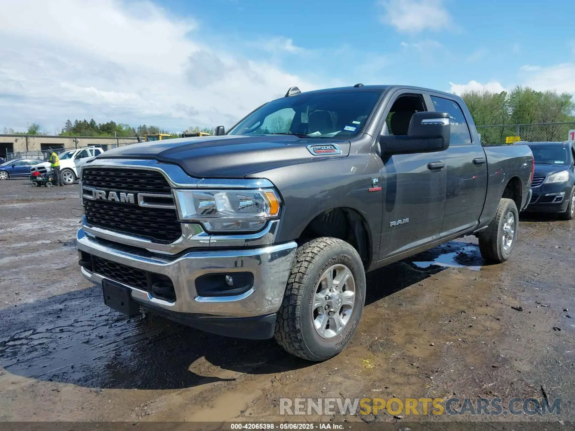 2 Photograph of a damaged car 3C6UR5DL2RG101520 RAM 2500 2024