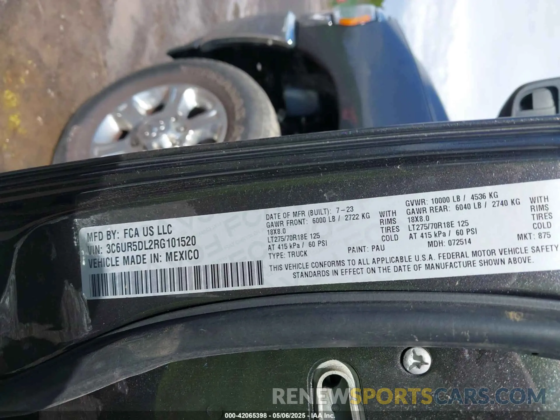 9 Photograph of a damaged car 3C6UR5DL2RG101520 RAM 2500 2024