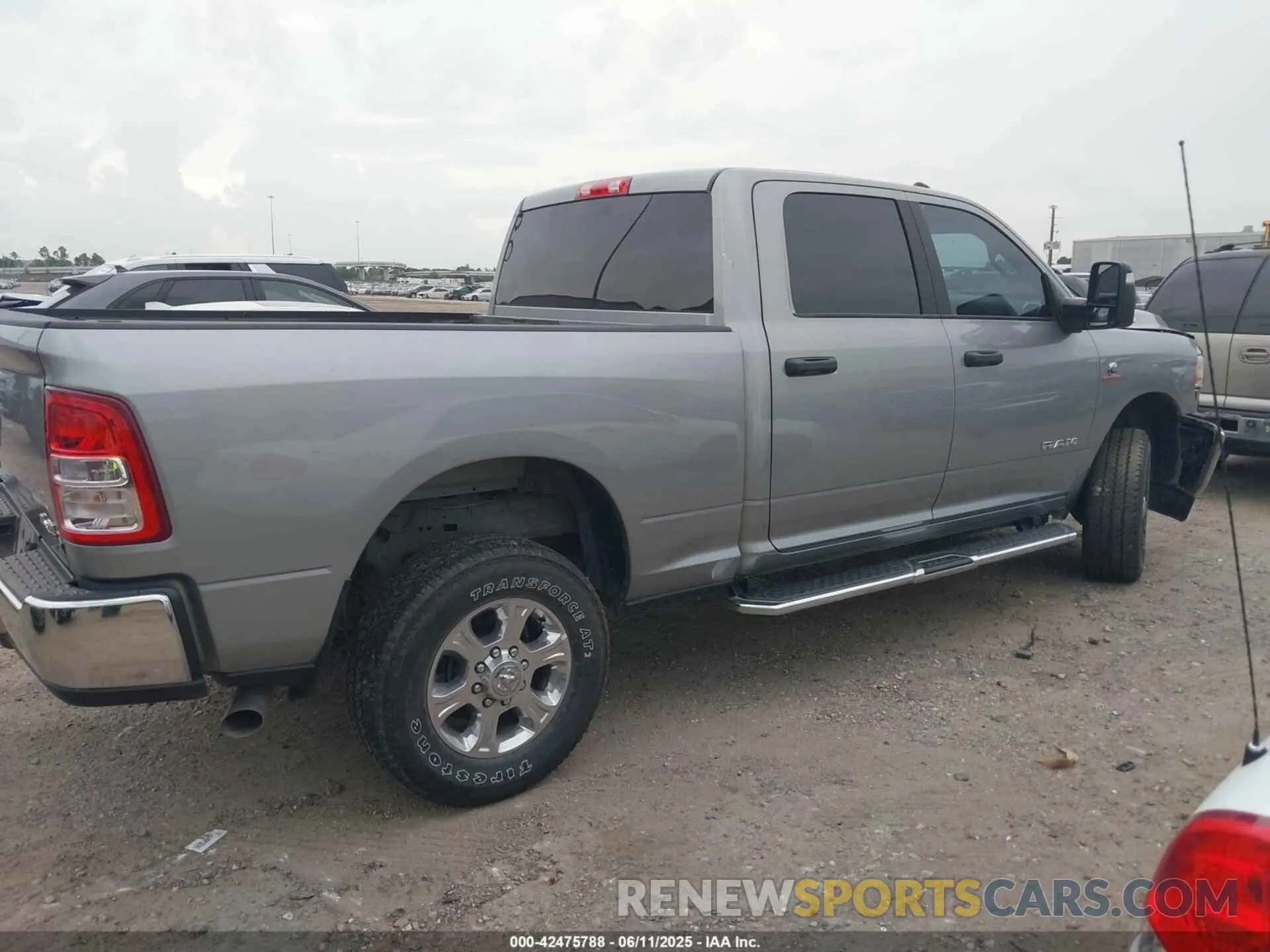 13 Photograph of a damaged car 3C6UR5DL2RG233158 RAM 2500 2024