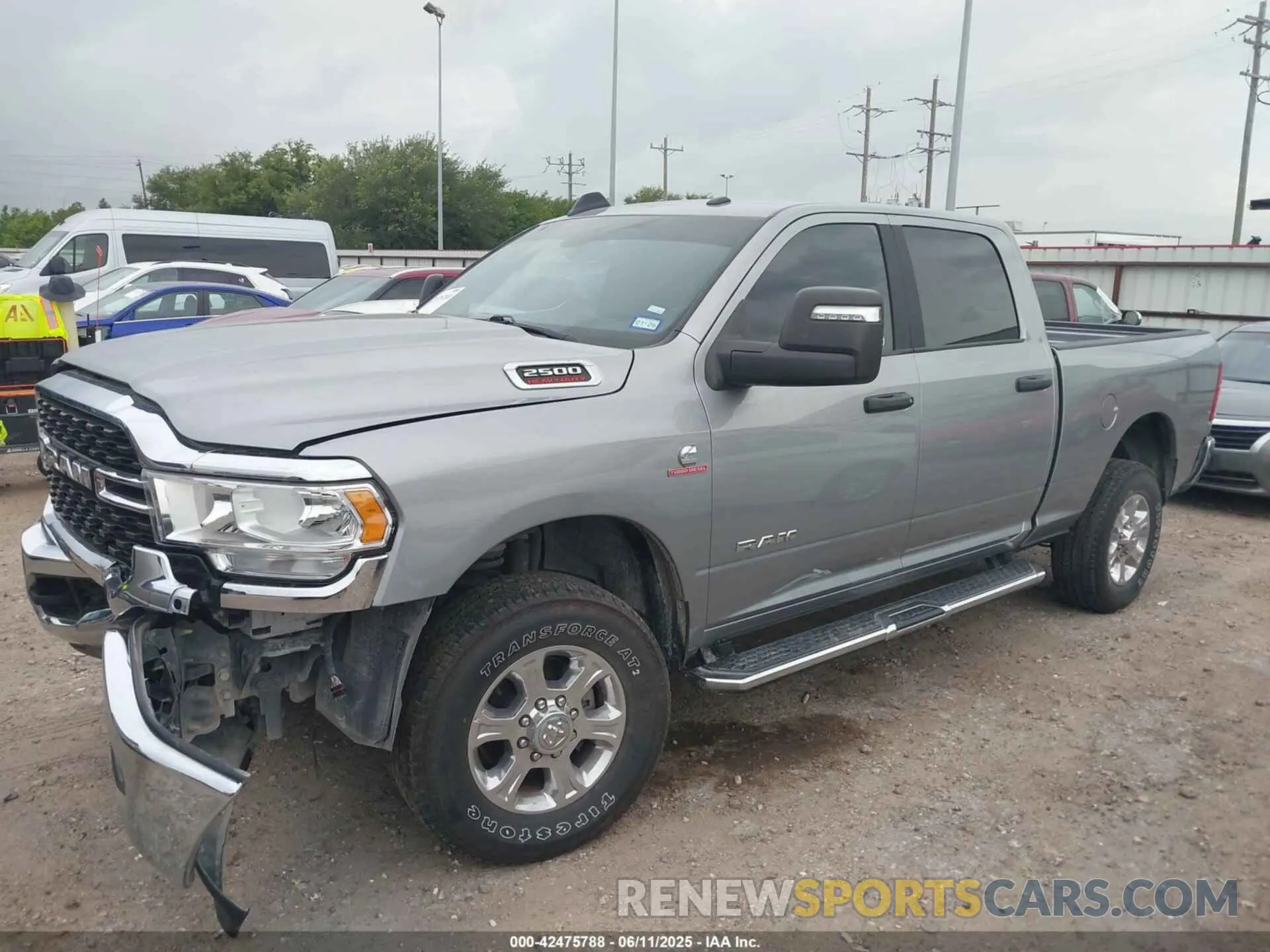 14 Photograph of a damaged car 3C6UR5DL2RG233158 RAM 2500 2024