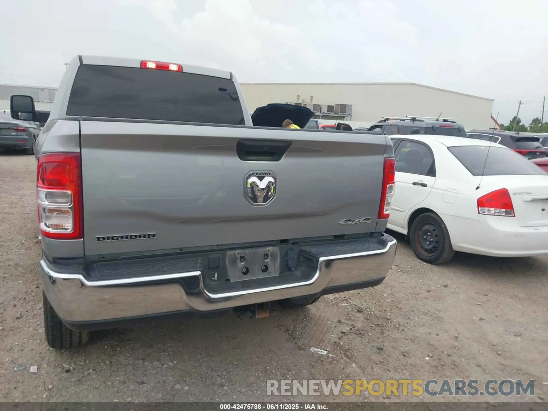 16 Photograph of a damaged car 3C6UR5DL2RG233158 RAM 2500 2024