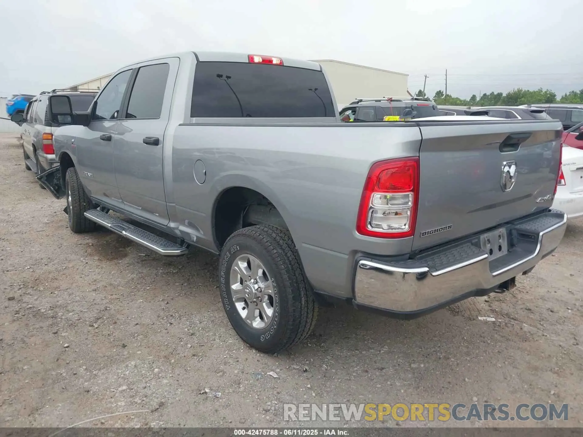 3 Photograph of a damaged car 3C6UR5DL2RG233158 RAM 2500 2024