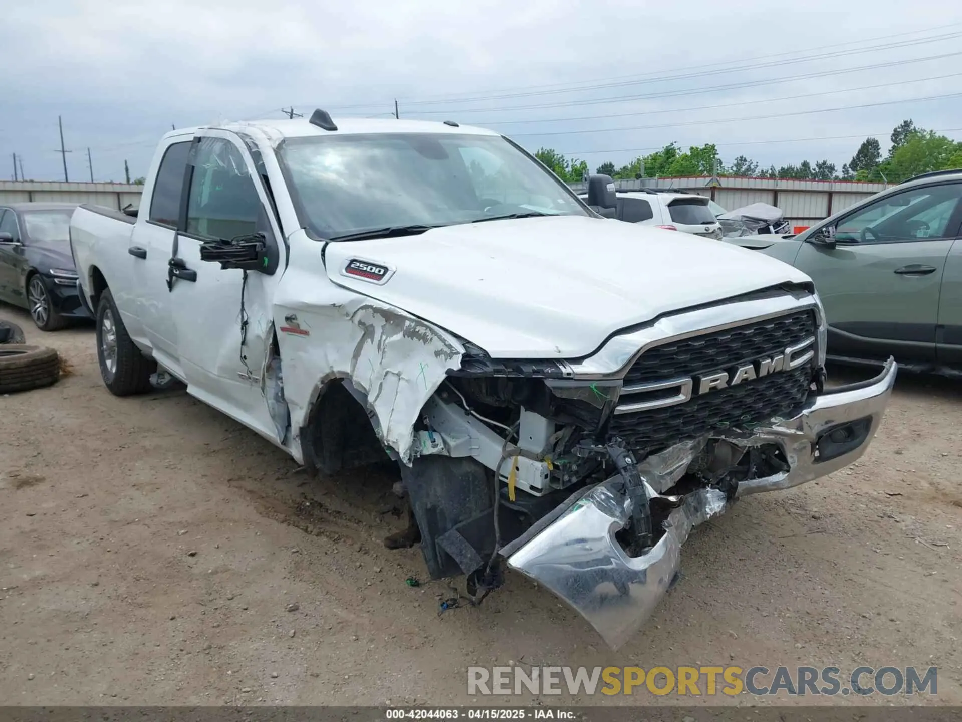 1 Photograph of a damaged car 3C6UR5DL2RG285616 RAM 2500 2024
