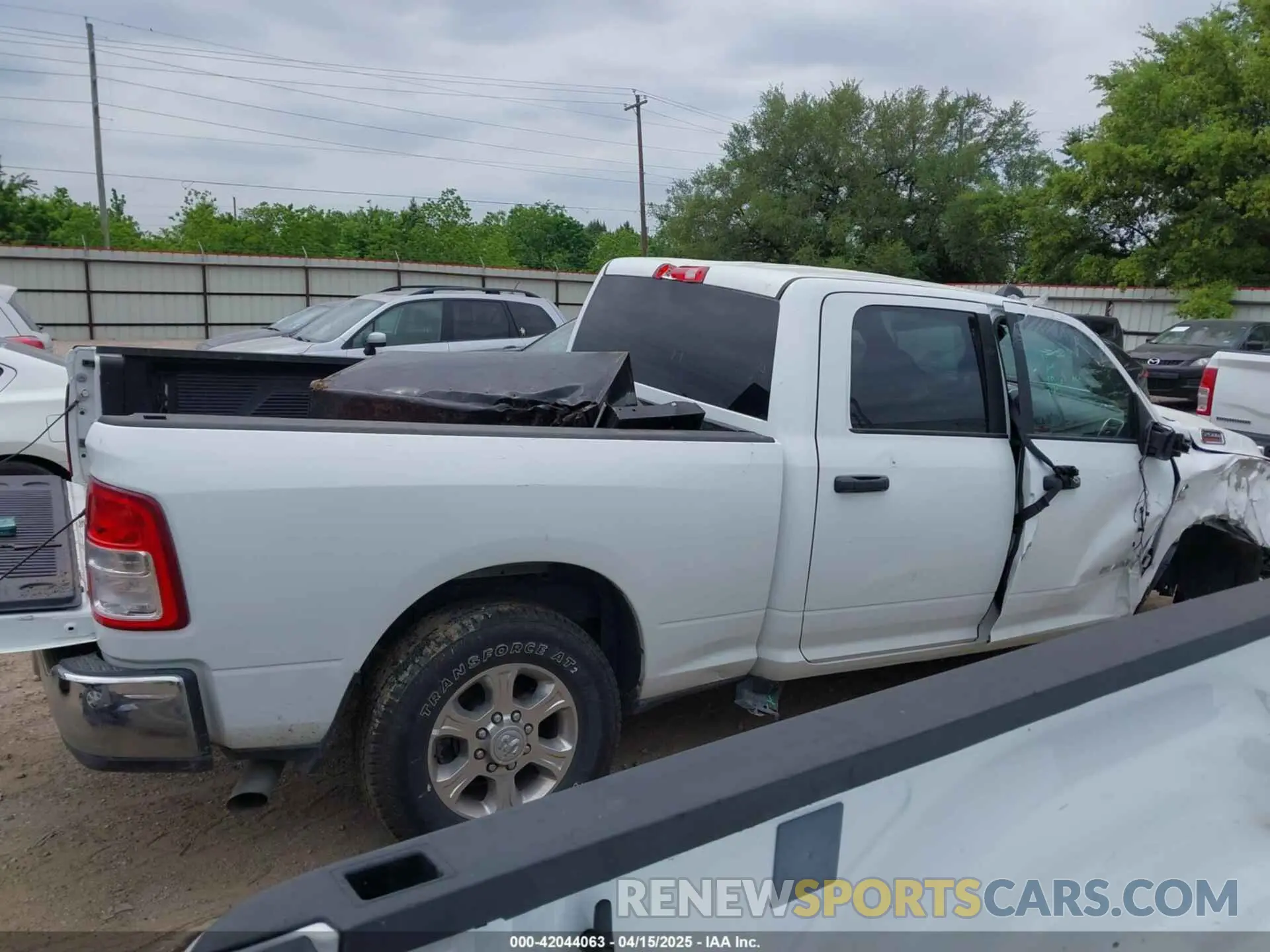 13 Photograph of a damaged car 3C6UR5DL2RG285616 RAM 2500 2024