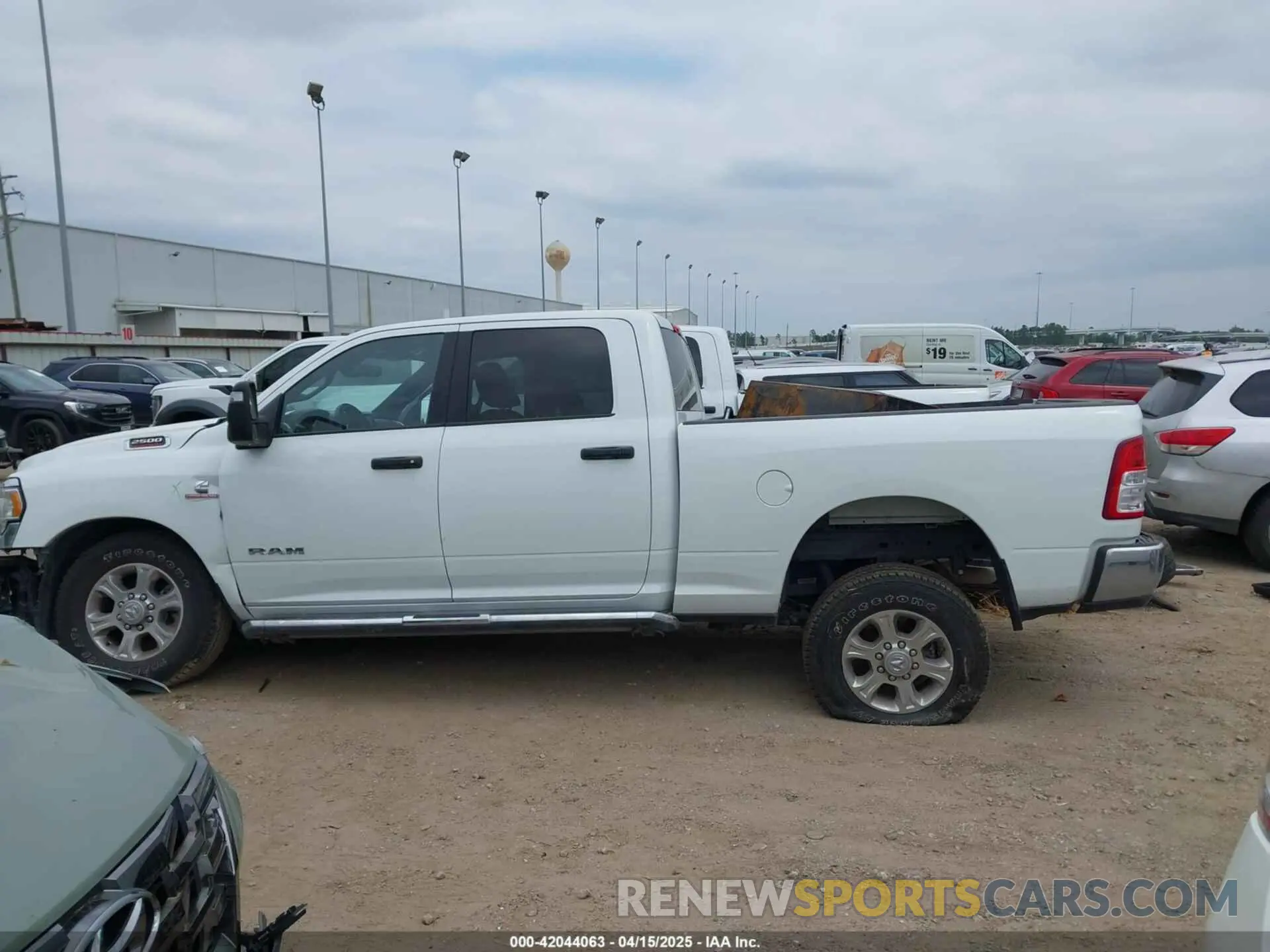 14 Photograph of a damaged car 3C6UR5DL2RG285616 RAM 2500 2024
