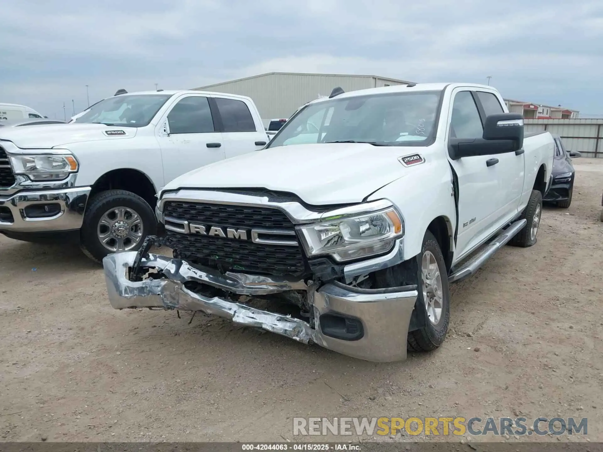 2 Photograph of a damaged car 3C6UR5DL2RG285616 RAM 2500 2024