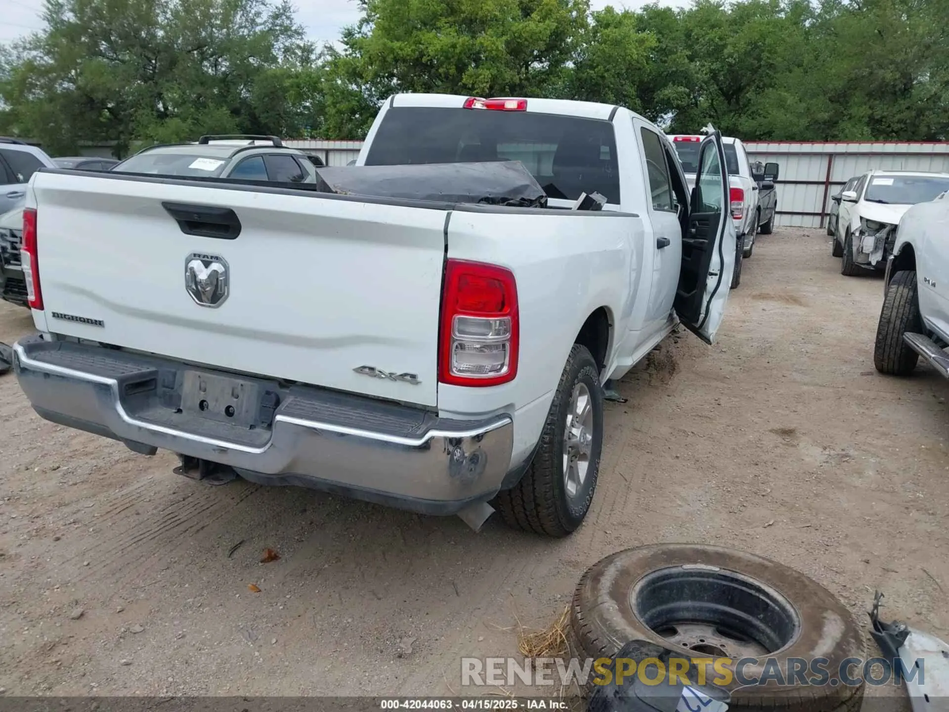4 Photograph of a damaged car 3C6UR5DL2RG285616 RAM 2500 2024