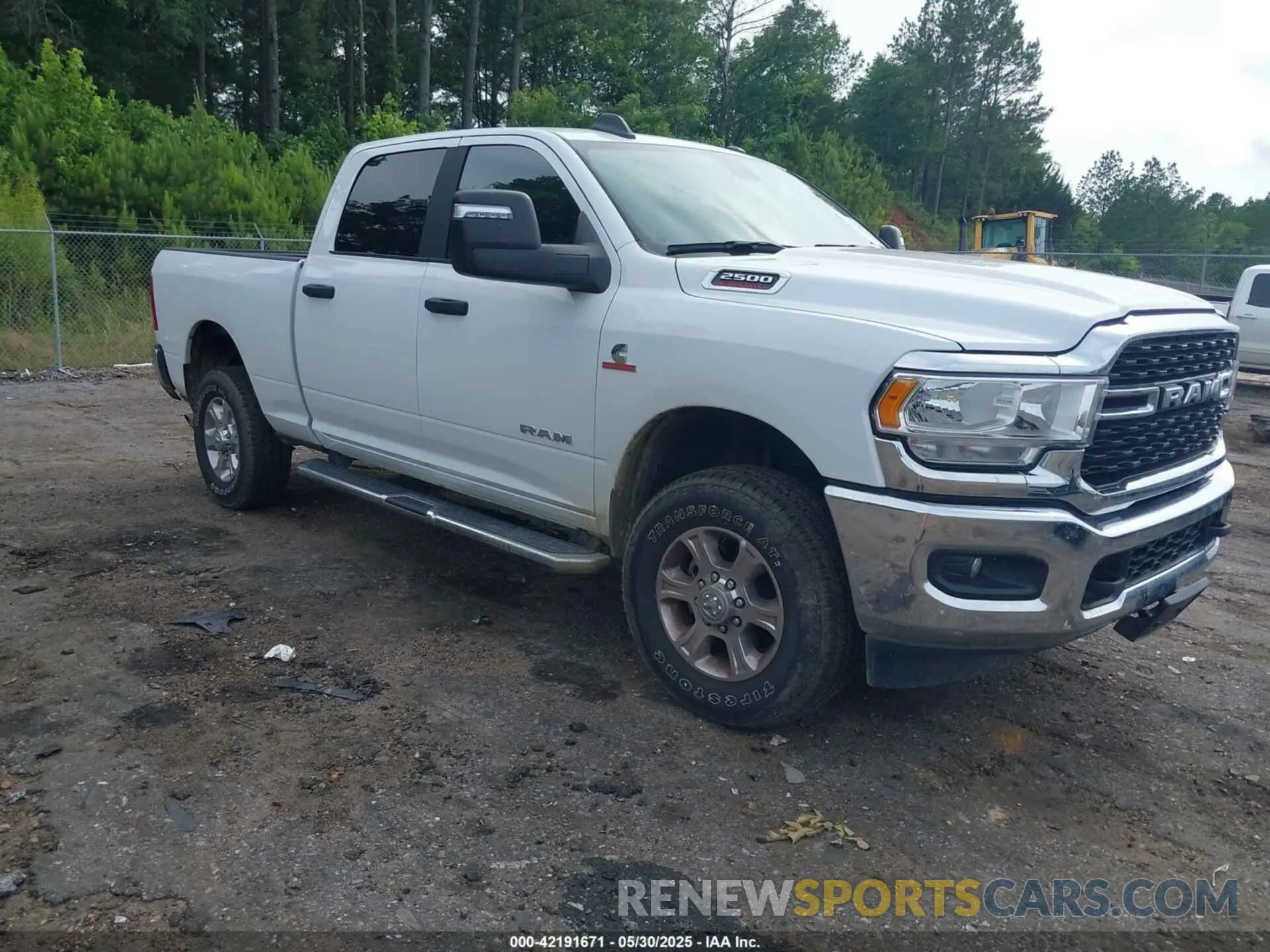 1 Photograph of a damaged car 3C6UR5DL2RG340744 RAM 2500 2024