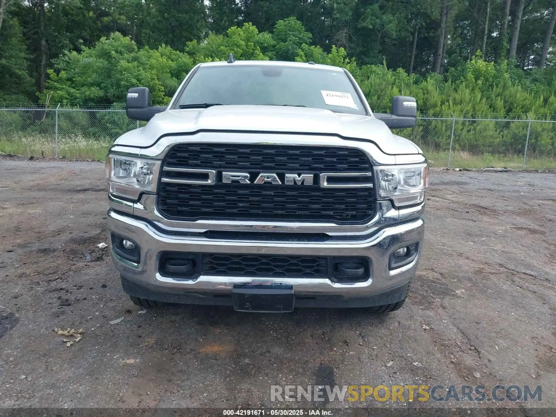 12 Photograph of a damaged car 3C6UR5DL2RG340744 RAM 2500 2024