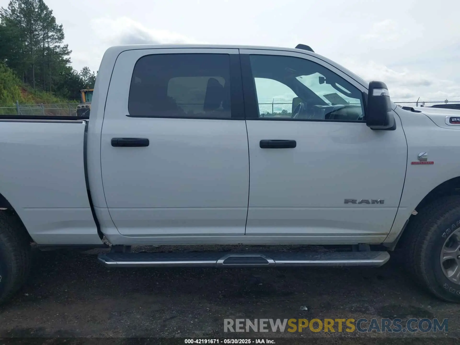 13 Photograph of a damaged car 3C6UR5DL2RG340744 RAM 2500 2024