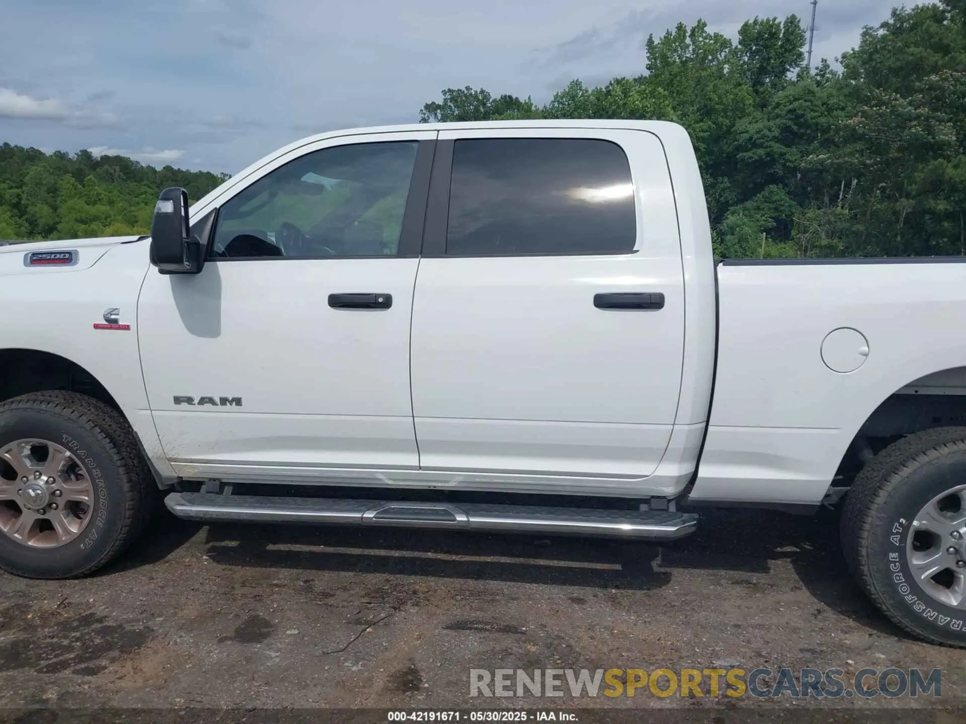 14 Photograph of a damaged car 3C6UR5DL2RG340744 RAM 2500 2024