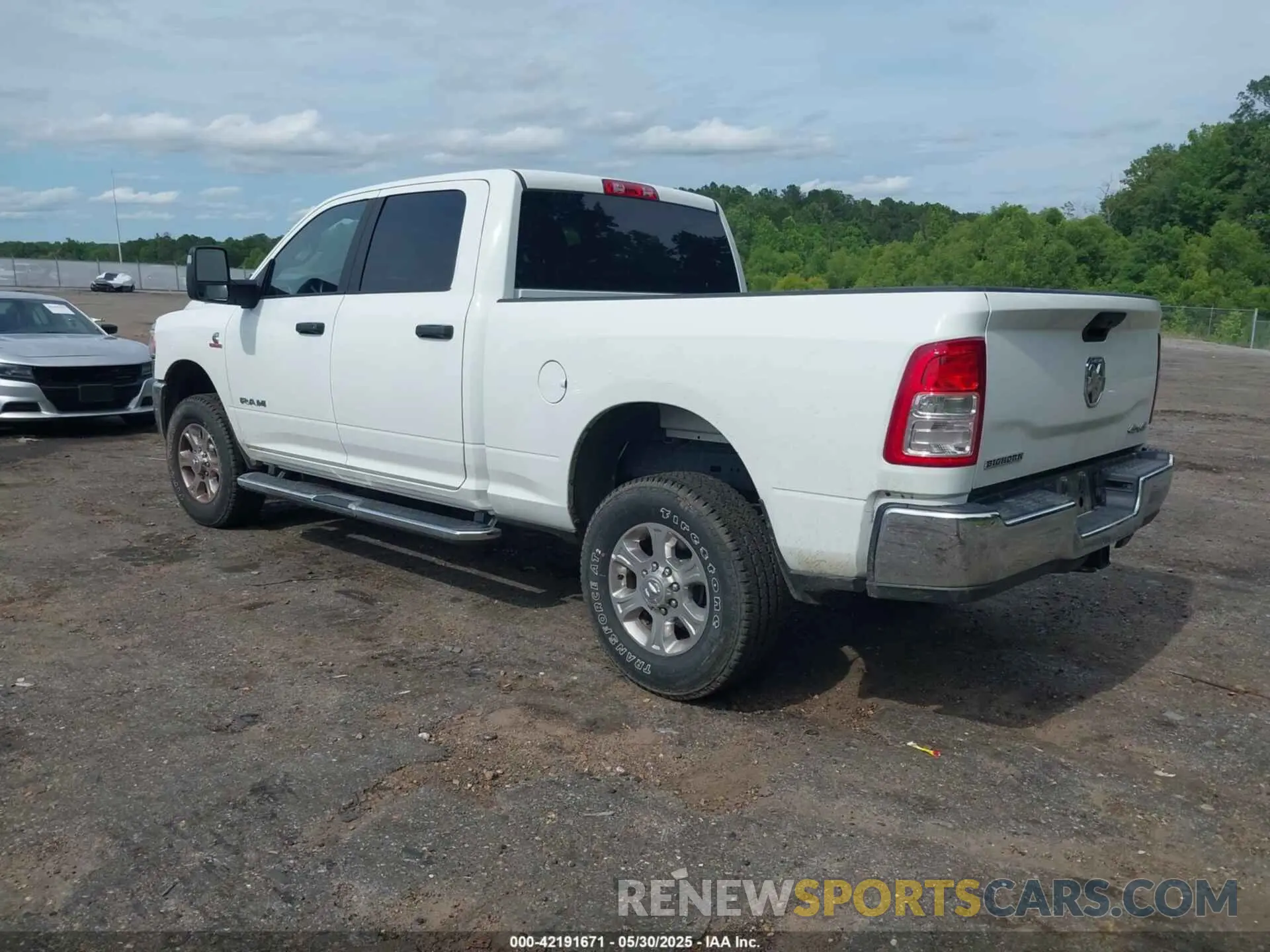 3 Photograph of a damaged car 3C6UR5DL2RG340744 RAM 2500 2024
