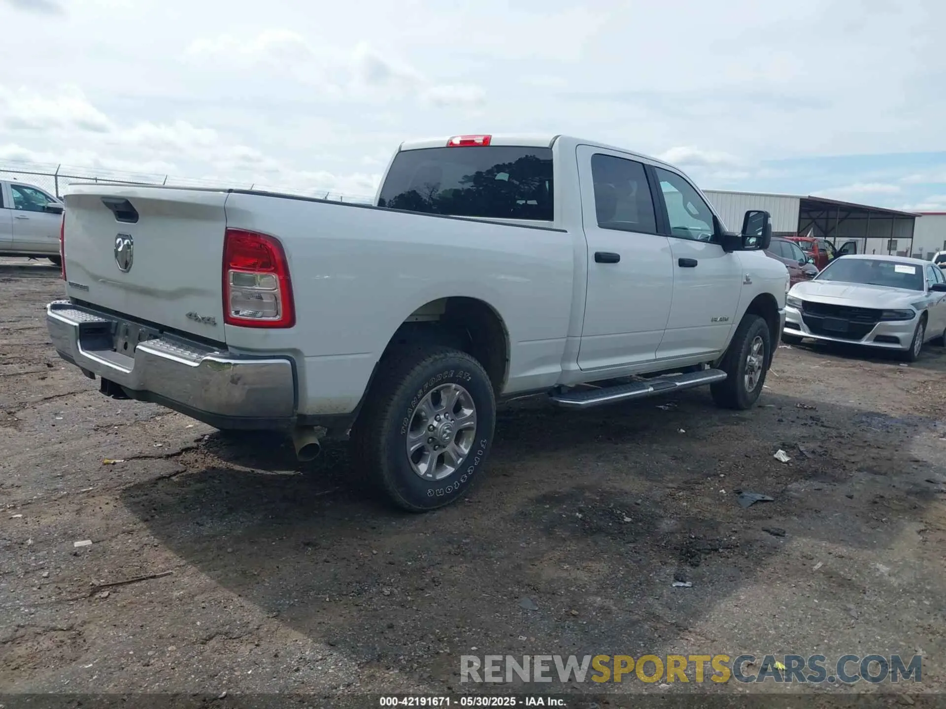 4 Photograph of a damaged car 3C6UR5DL2RG340744 RAM 2500 2024