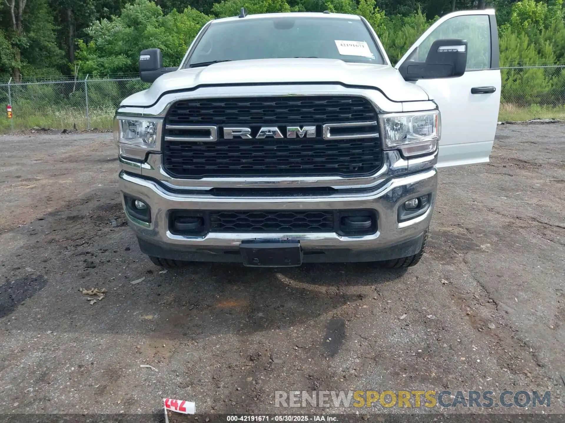 6 Photograph of a damaged car 3C6UR5DL2RG340744 RAM 2500 2024