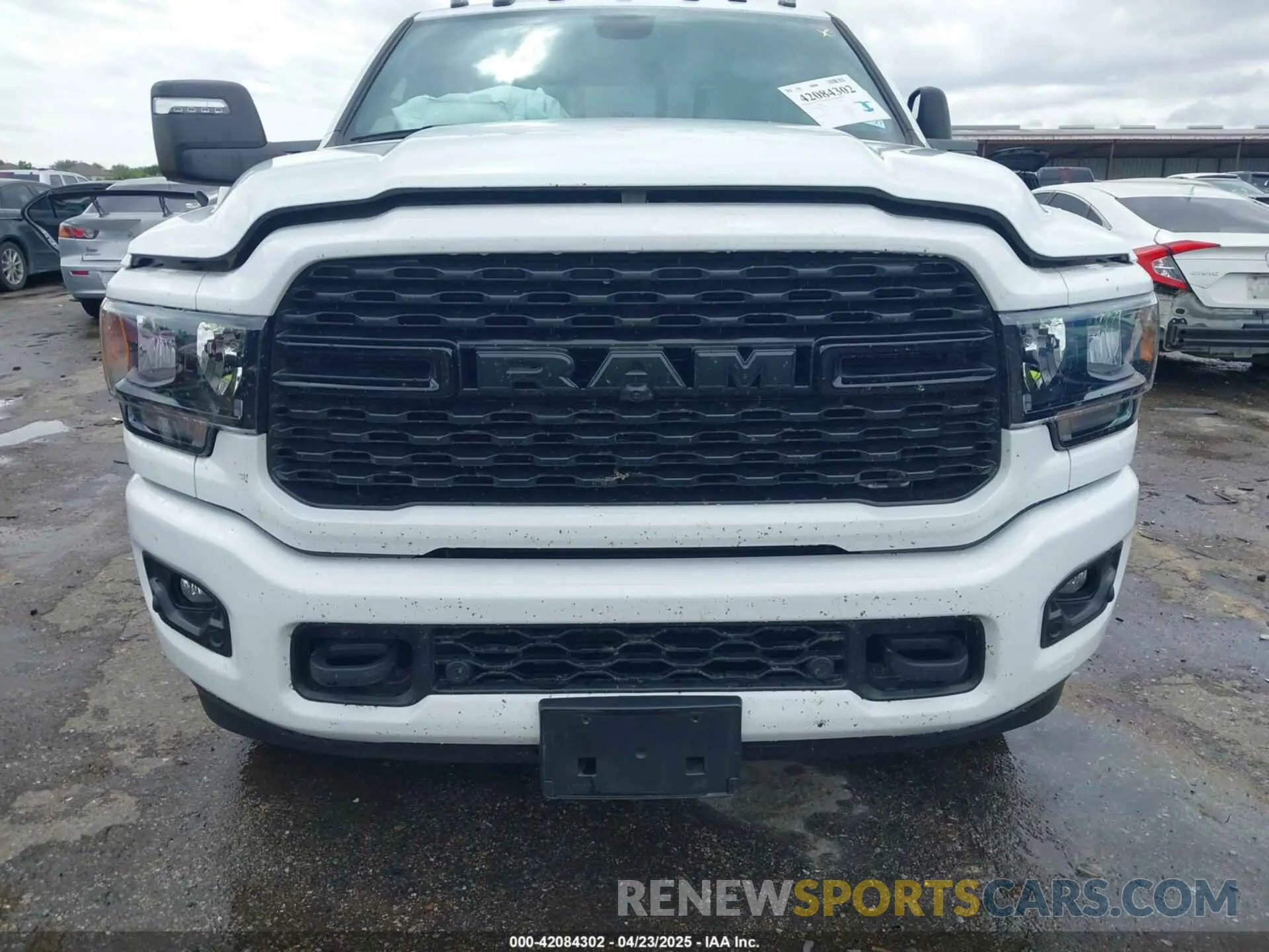 11 Photograph of a damaged car 3C6UR5DL2RG378362 RAM 2500 2024
