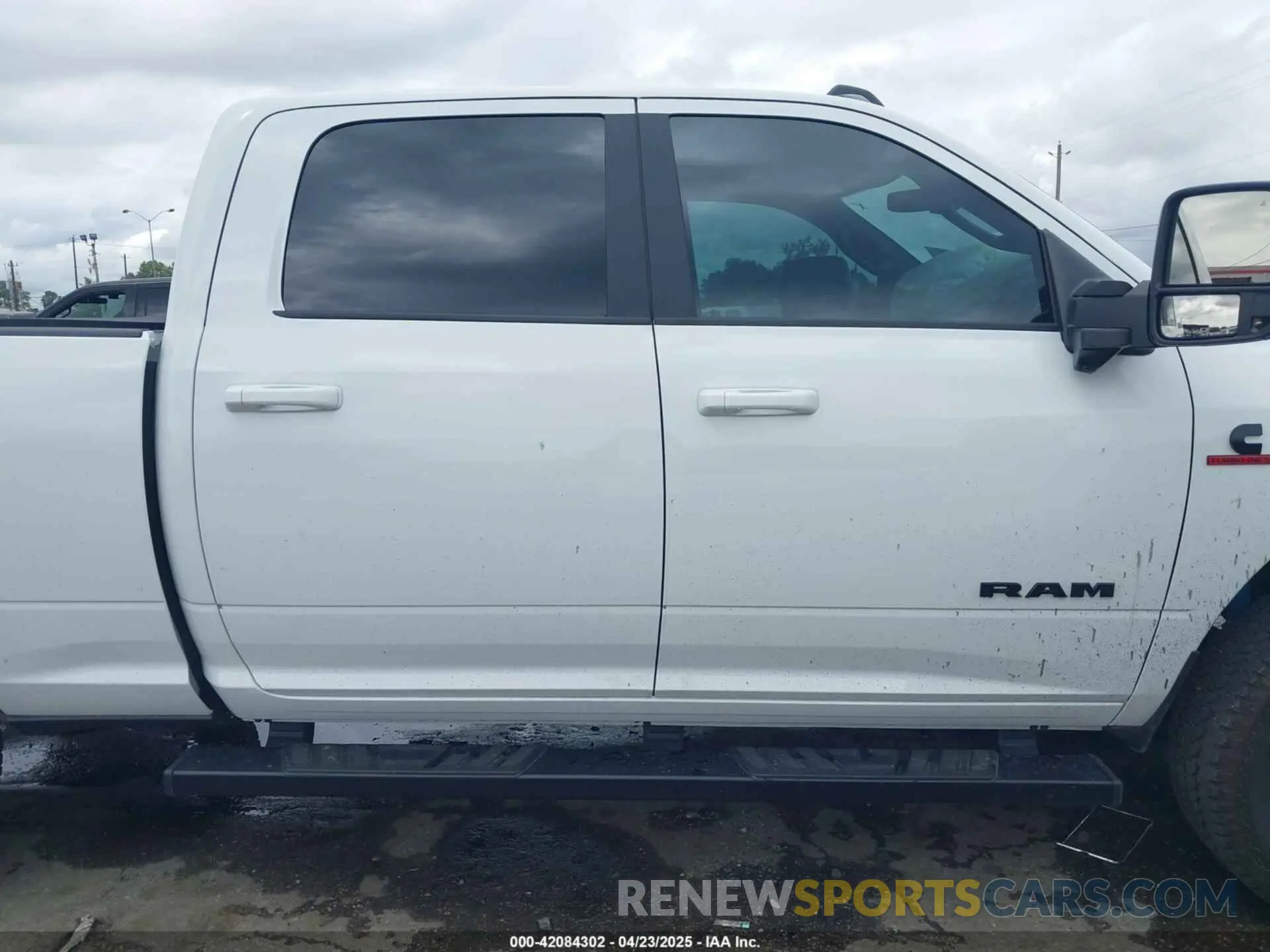 12 Photograph of a damaged car 3C6UR5DL2RG378362 RAM 2500 2024