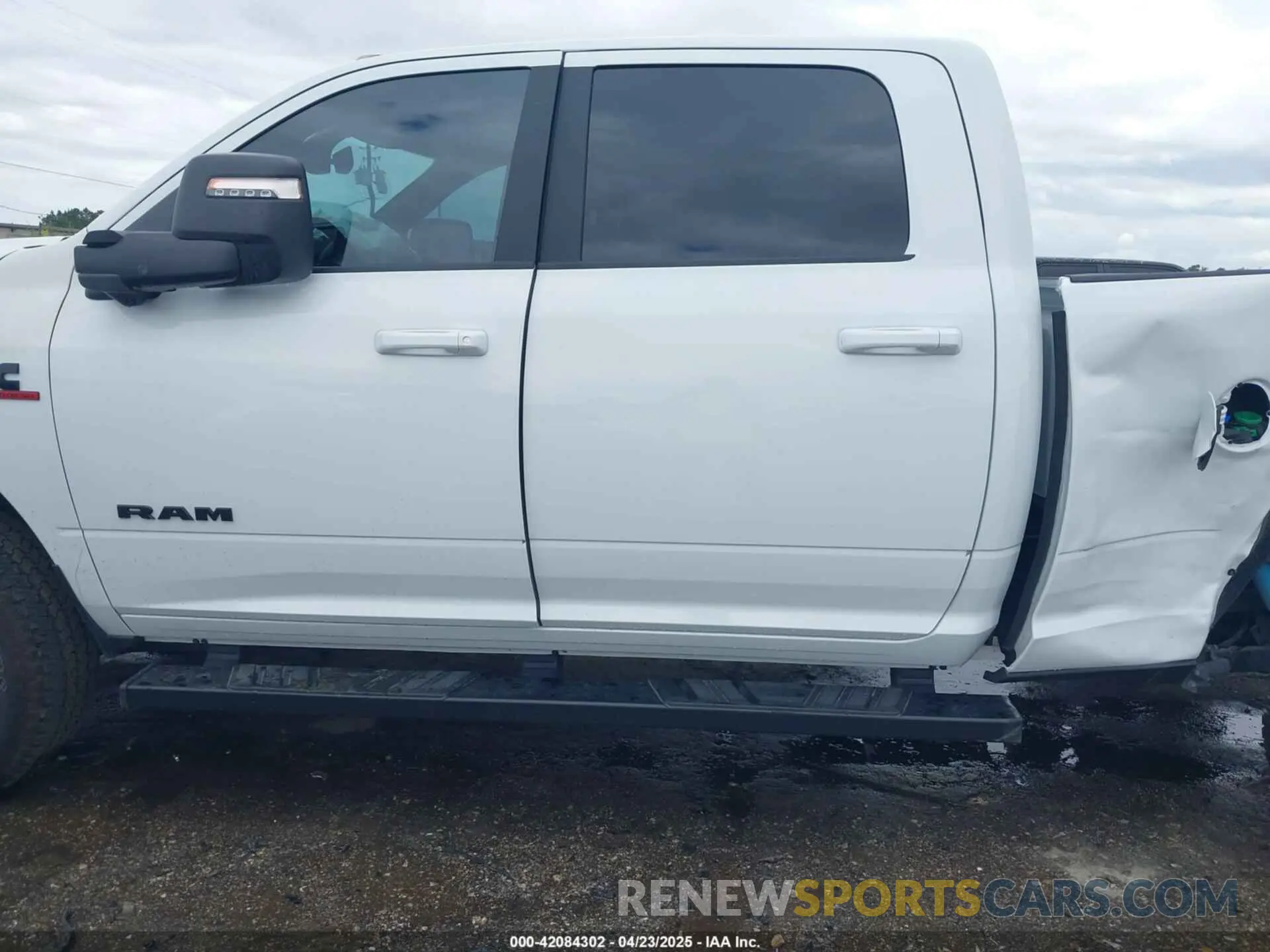 13 Photograph of a damaged car 3C6UR5DL2RG378362 RAM 2500 2024
