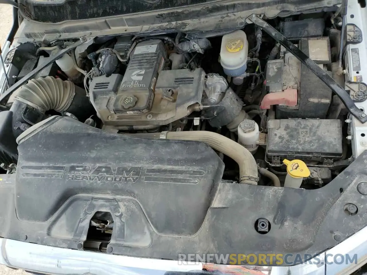 11 Photograph of a damaged car 3C6UR5DL3RG176923 RAM 2500 2024
