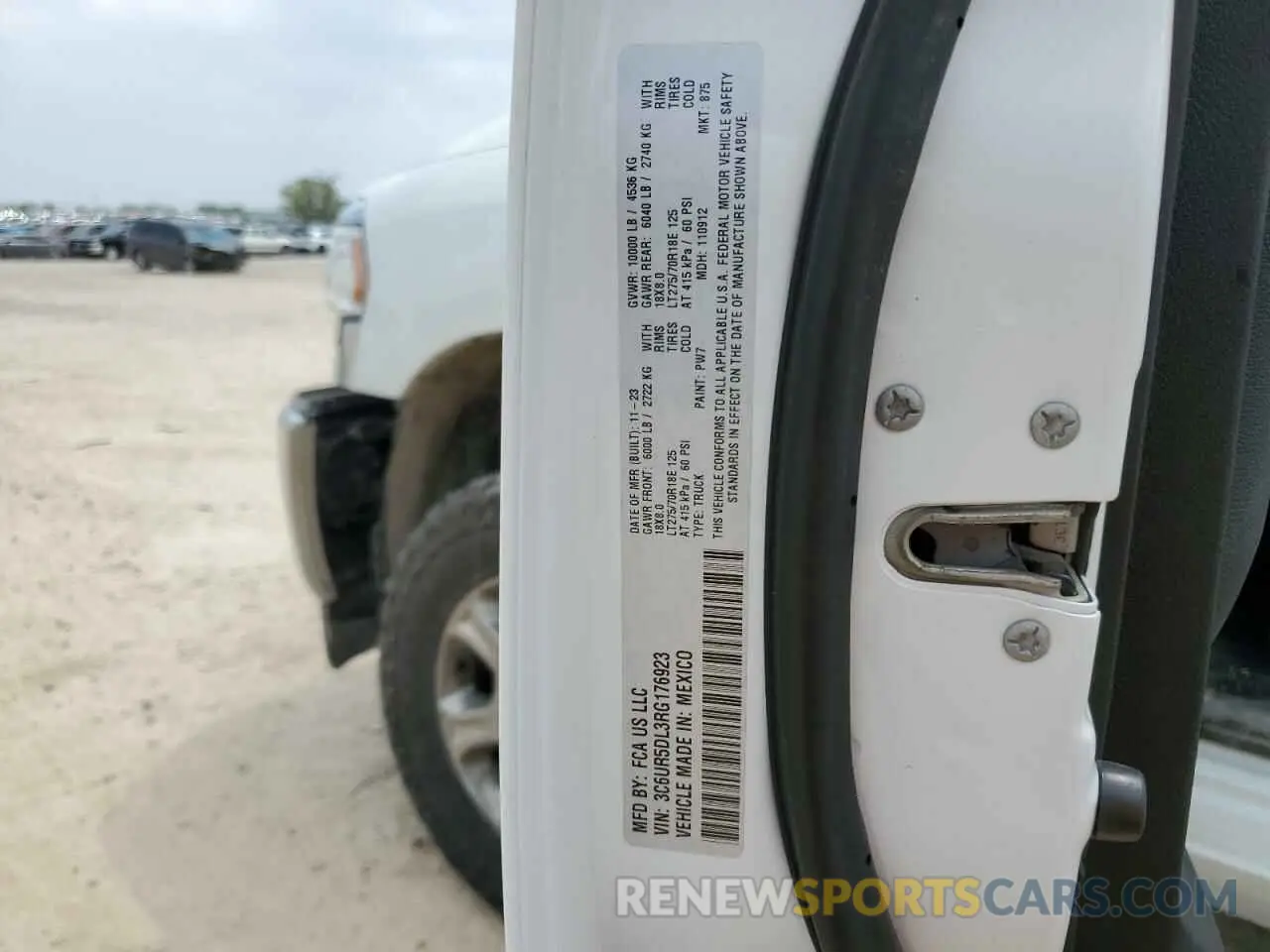 13 Photograph of a damaged car 3C6UR5DL3RG176923 RAM 2500 2024