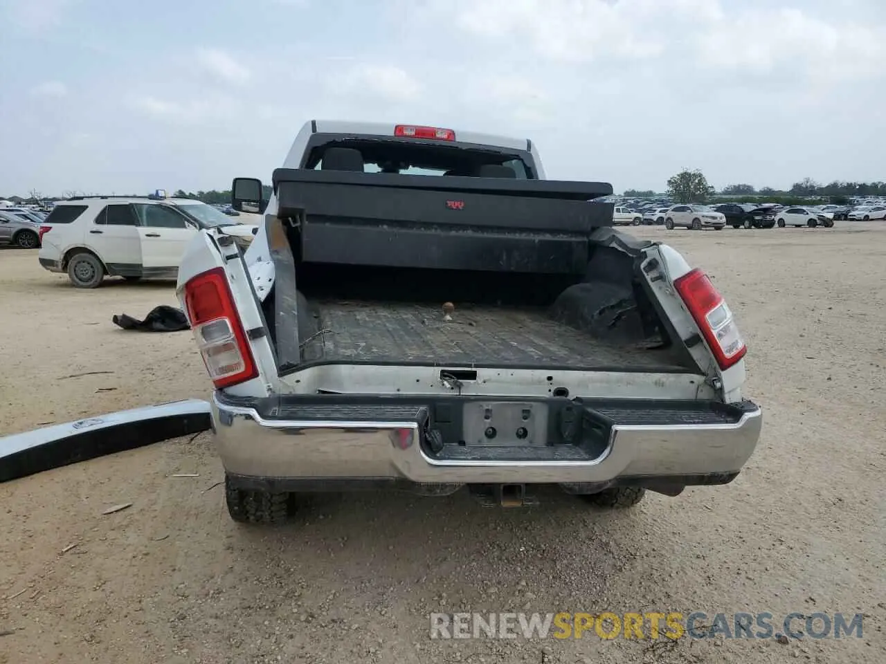 6 Photograph of a damaged car 3C6UR5DL3RG176923 RAM 2500 2024