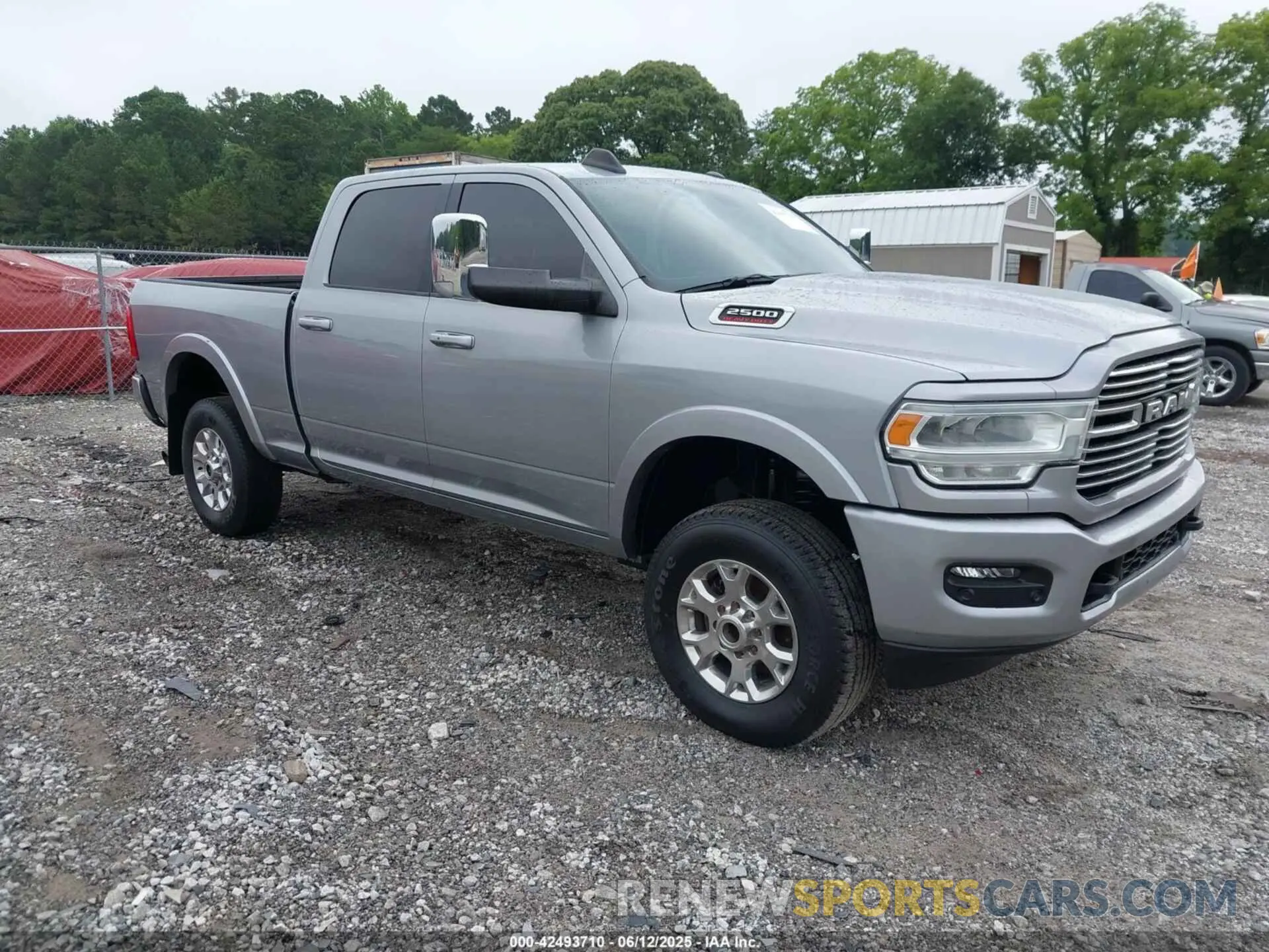 1 Photograph of a damaged car 3C6UR5DL4RG101518 RAM 2500 2024