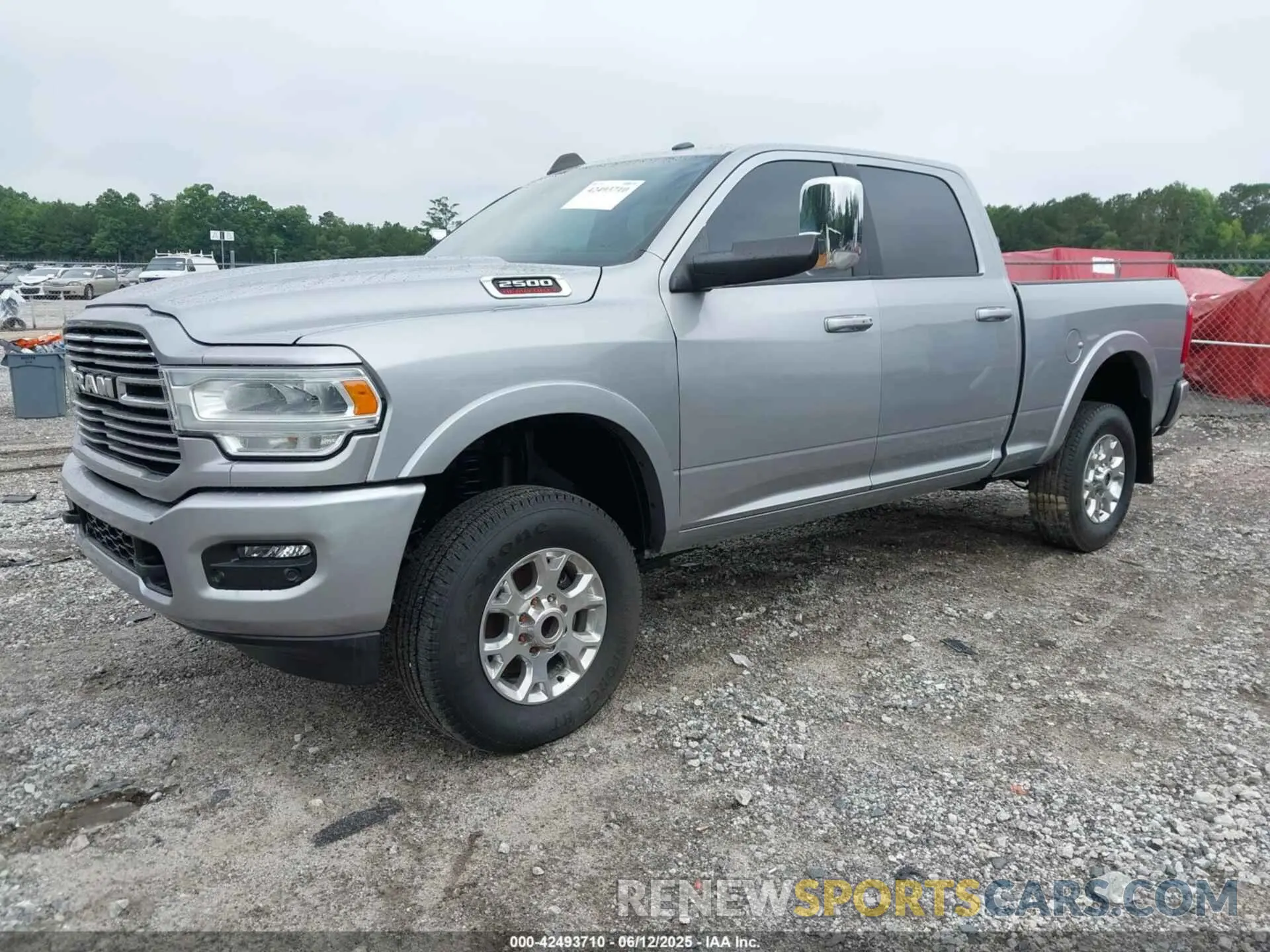 2 Photograph of a damaged car 3C6UR5DL4RG101518 RAM 2500 2024