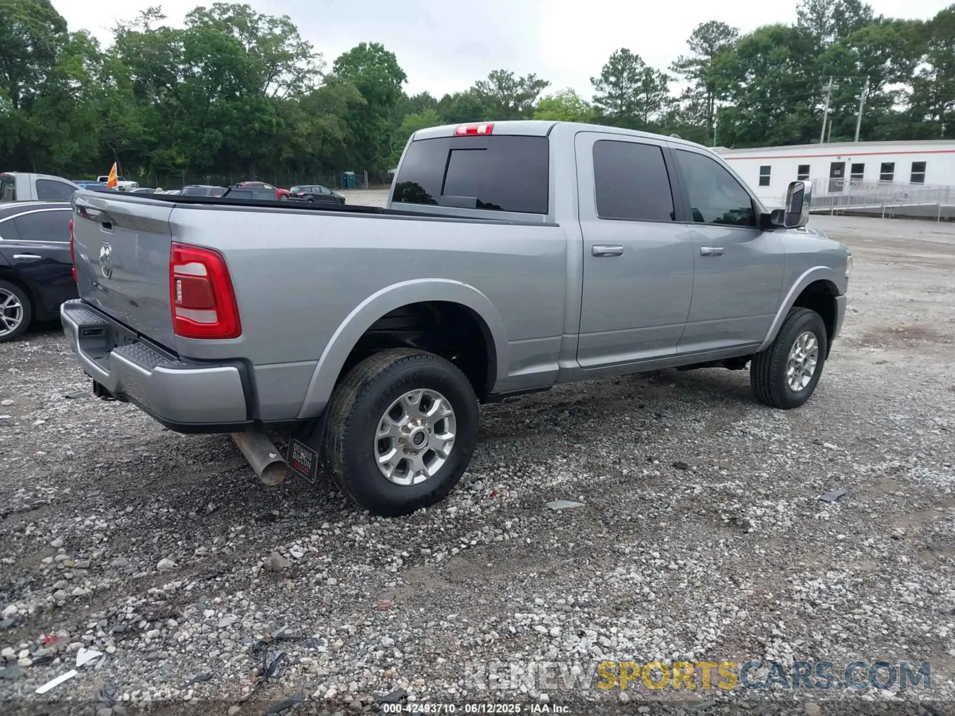 4 Photograph of a damaged car 3C6UR5DL4RG101518 RAM 2500 2024