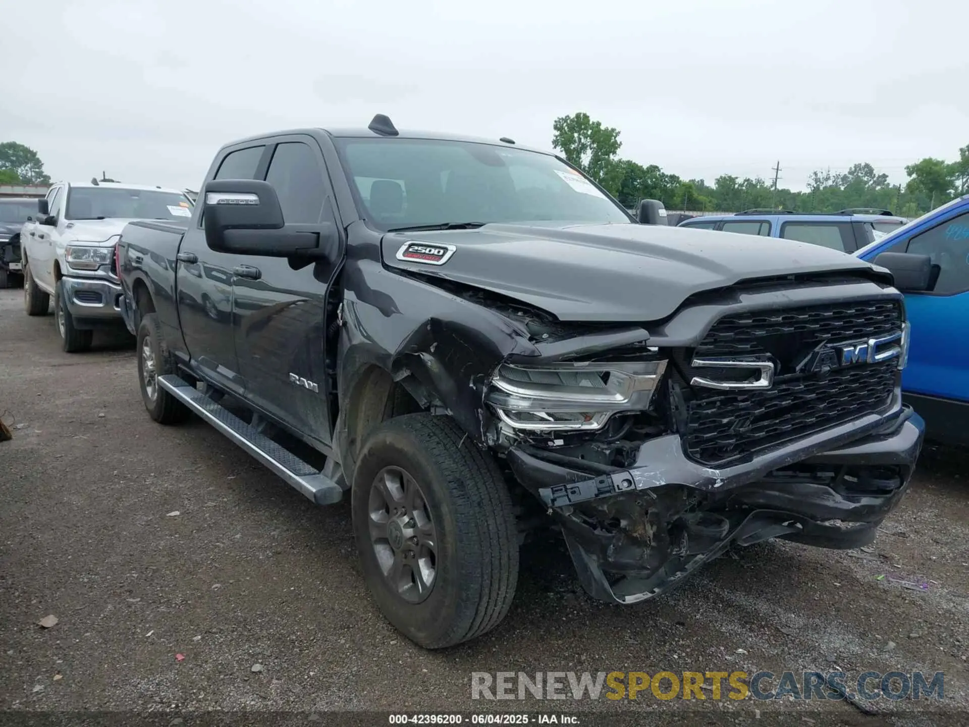 1 Photograph of a damaged car 3C6UR5DL4RG202719 RAM 2500 2024