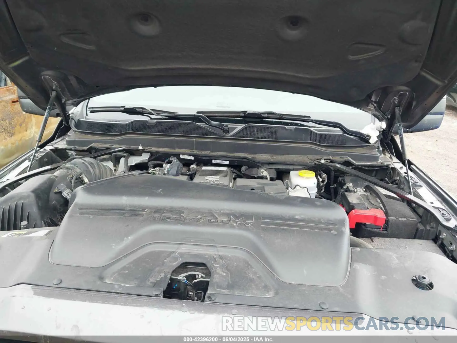 10 Photograph of a damaged car 3C6UR5DL4RG202719 RAM 2500 2024