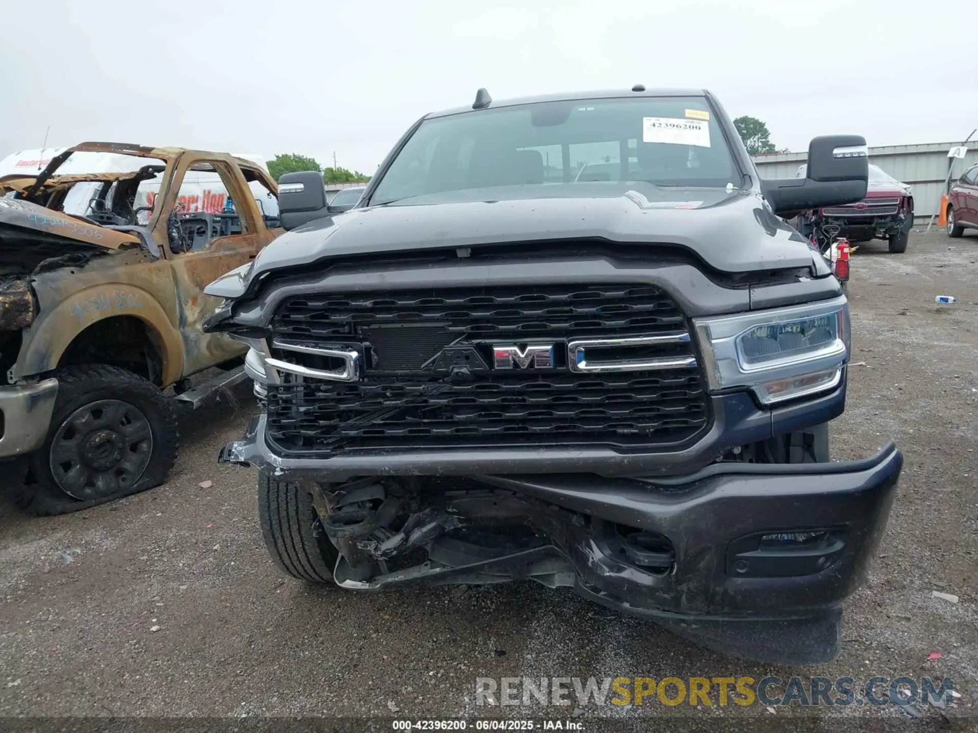 12 Photograph of a damaged car 3C6UR5DL4RG202719 RAM 2500 2024