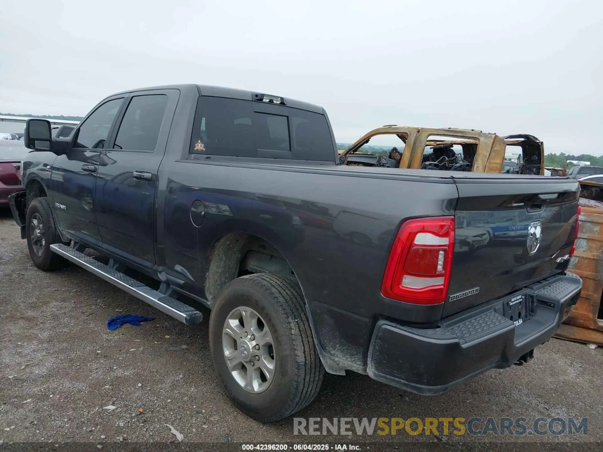 3 Photograph of a damaged car 3C6UR5DL4RG202719 RAM 2500 2024