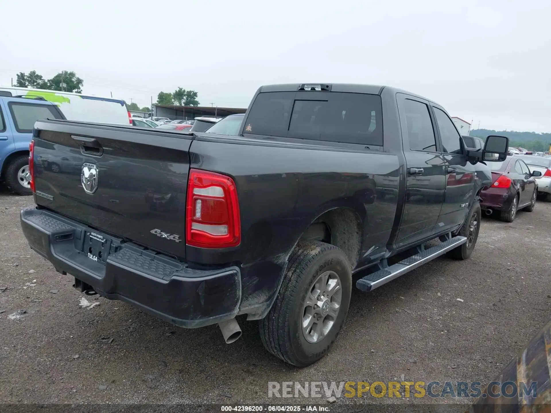 4 Photograph of a damaged car 3C6UR5DL4RG202719 RAM 2500 2024