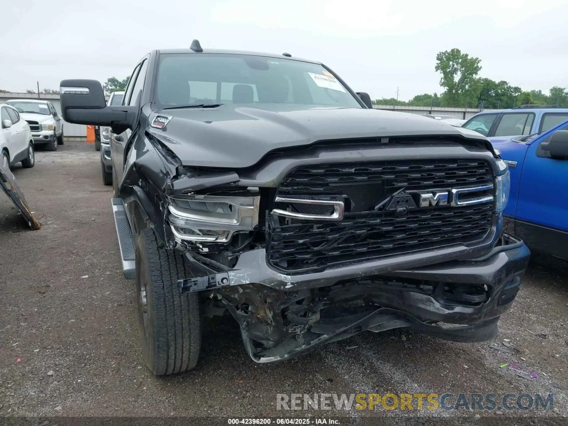 6 Photograph of a damaged car 3C6UR5DL4RG202719 RAM 2500 2024