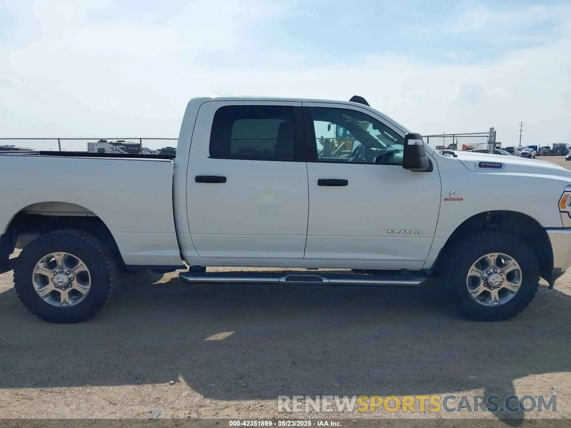 13 Photograph of a damaged car 3C6UR5DL4RG246011 RAM 2500 2024
