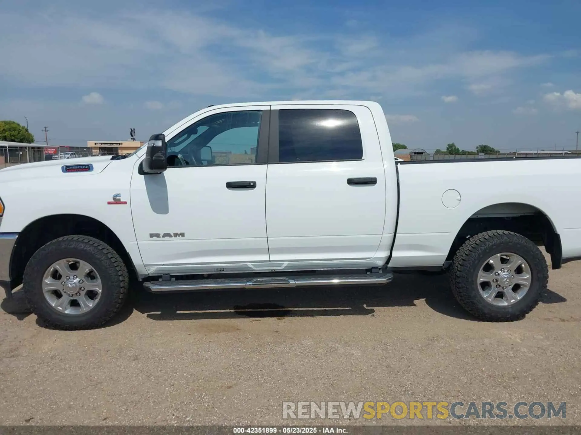 14 Photograph of a damaged car 3C6UR5DL4RG246011 RAM 2500 2024