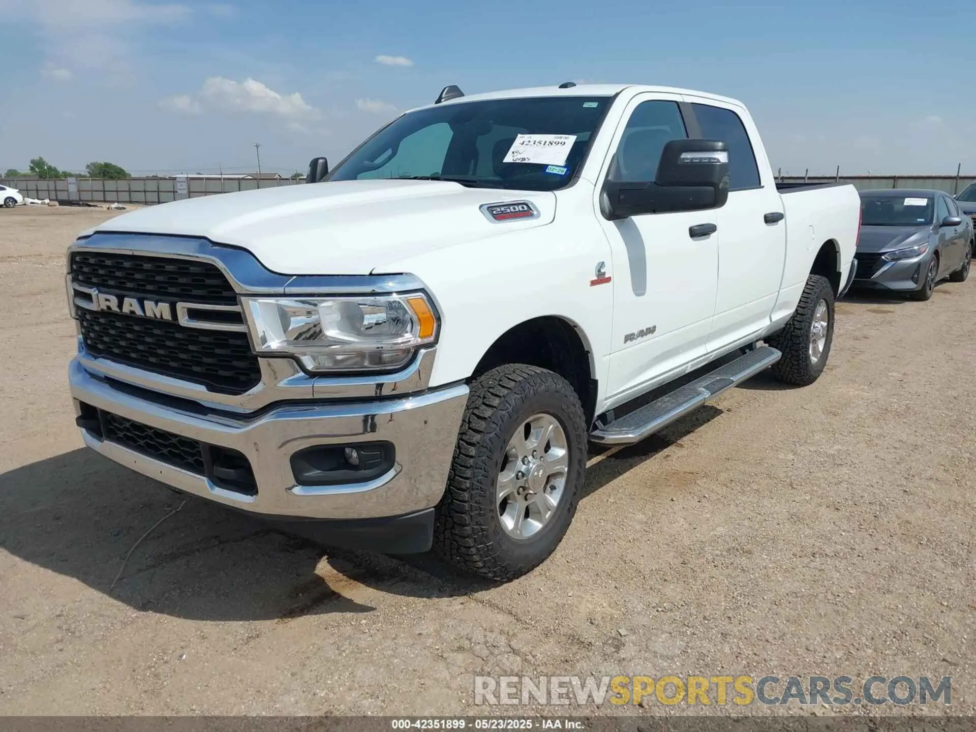 2 Photograph of a damaged car 3C6UR5DL4RG246011 RAM 2500 2024