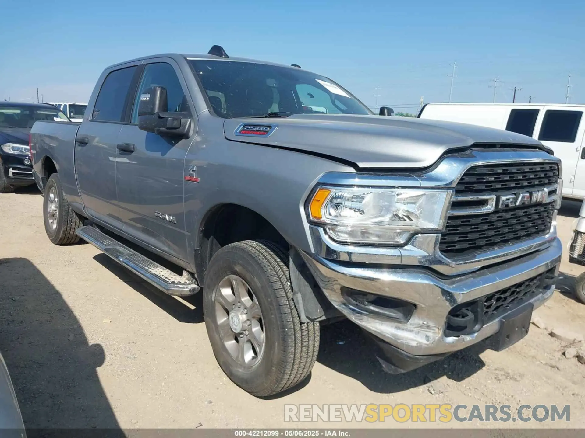 1 Photograph of a damaged car 3C6UR5DL4RG296228 RAM 2500 2024